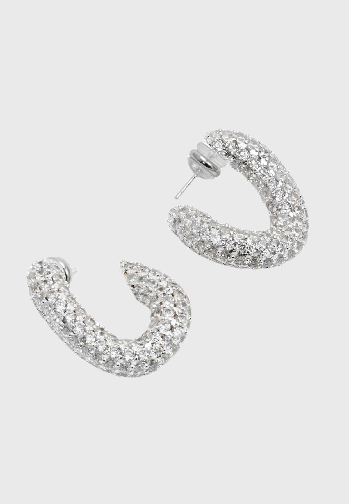 Sparkling GIGI - Precious silver-plated crystal hoop earrings with twist